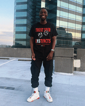 Load image into Gallery viewer, Red/Black &quot;INSTINCTS&quot; Tee
